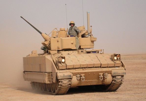Bradley Fighting Vehicle drives off range. CONTINGENCY OPERATING BASE SPEICHER, Iraq – Infantrymen from 1st Battalion, 5th Cavalry Regiment, 2nd Advise and Assist Brigade, 1st Cavalry Division, drive their M2A3 Bradley Fighting Vehicle off of Memorial Range after zeroing the 25mm main gun and M240B machine gun during a live fire exercise in support of Operation New Dawn near Contingency Operating Base Speicher, Iraq, July 29, 2011. (U.S. Army photo by Sgt. Quentin Johnson, 2nd AAB PAO, 1st Cav. Div., USD – N)